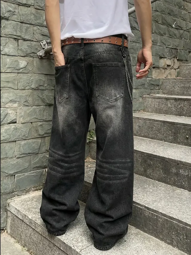 Washed wide-leg jeans worn on concrete stairs
